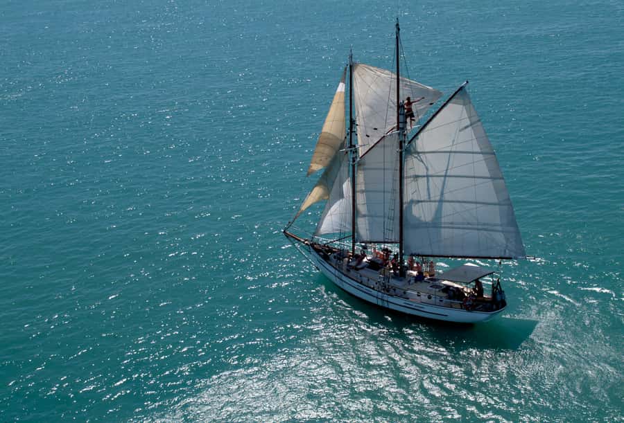 Airlie Beach: Providence Whitehaven Day Sail with Snorkeling - Sailing Past Whitsunday Passage Toward Tongue Bay