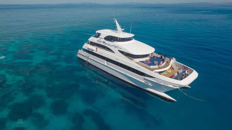 Cairns: Great Barrier Reef Cruise & Scenic Helicopter Flight - Comfort, Deck Space, and Handling a Full-Day Reef Schedule