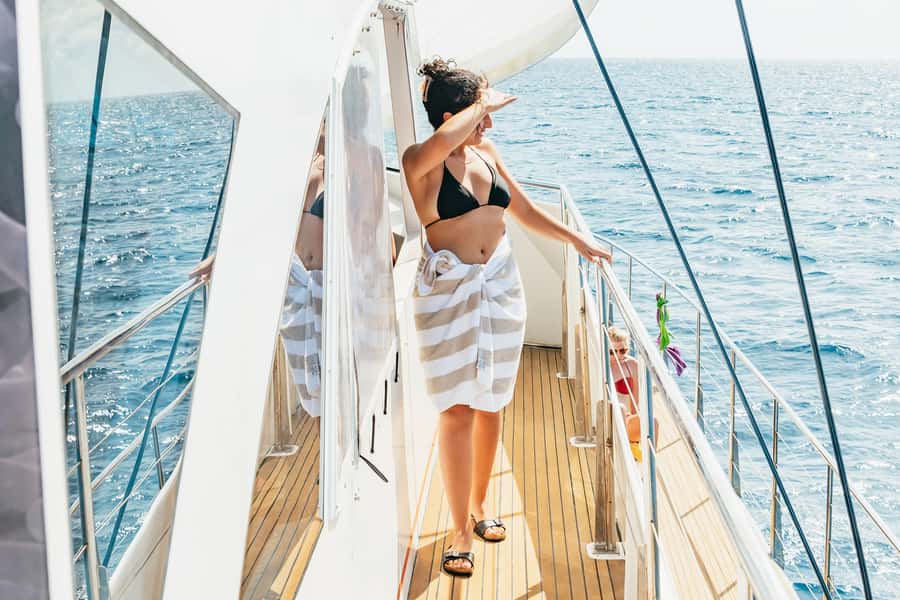 From Cairns: Great Barrier Reef Cruise by Premium Catamaran - First reef time: snorkel, swim, or just watch from the netted decks