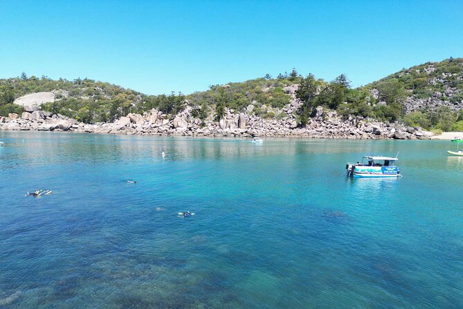 4H Snorkeling and Fishing Cruise on Magnetic Island - Fishing onboard: gear is provided, and the crew helps you land it