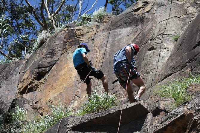 Abseiling the Kangaroo Point Cliffs in Brisbane - The abseil moment: stepping off a 20-metre cliff with help every step