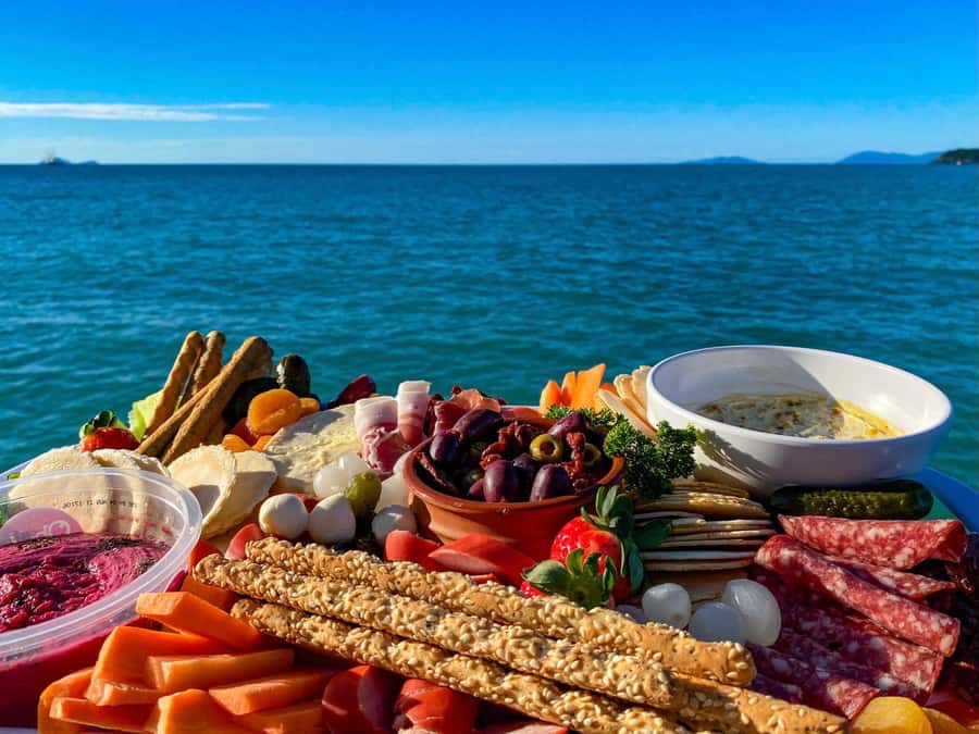 Airlie Beach: BYOB Sunset Sail in Style Catamaran Cruise - Airlie Beach cruise moments: sailing views plus snack and coffee time