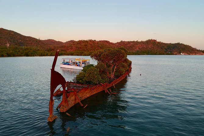 Aquascene Magnetic Island Sunset & Shipwreck Tour - Cruising the Magnetic Island coast: Nelly Bay to Cockle Bay