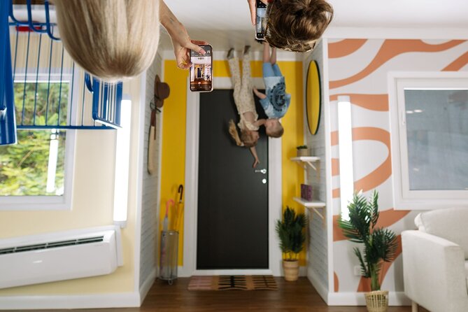 Australia's First Upside Down House Photo Experience - Posing Tips That Make Your Upside-Down Photos Look Better