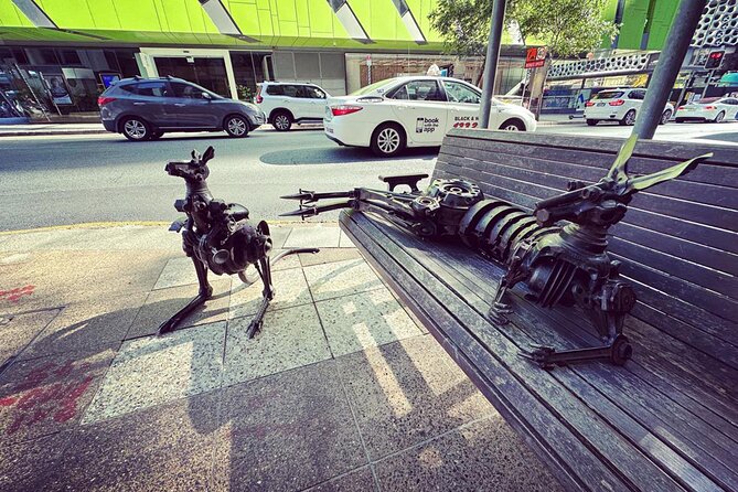 Brisbane City Walking Tour: local guide, small group, 100 mins - ANZAC Square and the Visitor Centre building: memory and style