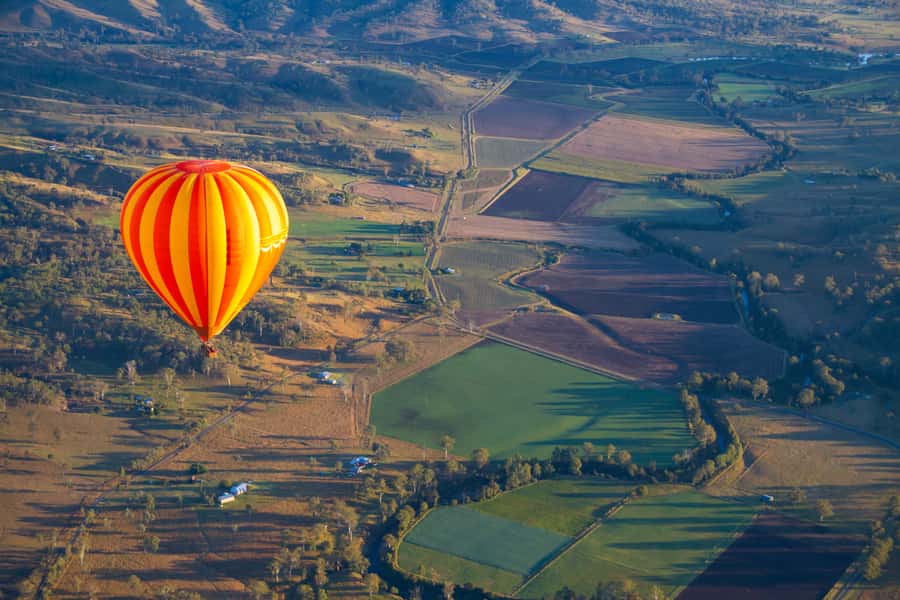 Brisbane: Hot Air Balloon Flight with Vineyard Breakfast - Landing day fun: folding the balloon and getting your photos