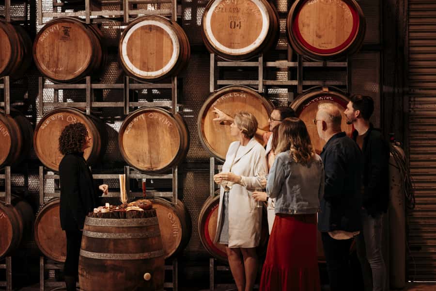 Brisbane: Wine & Dine In The Vines - Behind the winery: tasting wines from vats and bottles