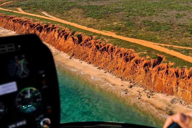 Broome's Cliffs & Coast: 60-Minute Scenic Helicopter Experience - Northward Coastal Views: Reefs, Clear Shallow Waters, and the Lighthouse Moment