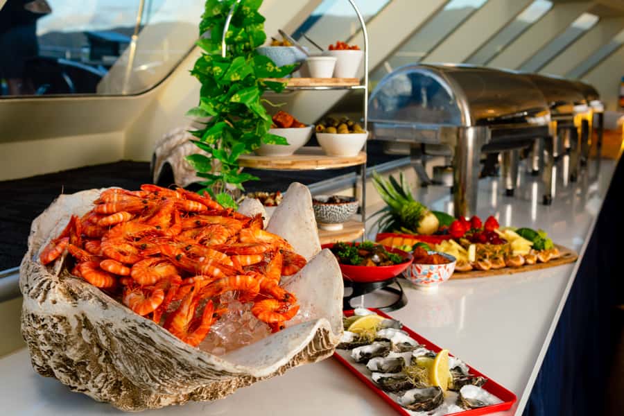 Cairns: City Sights Tour with Evening Dinner Cruise - Palm Cove break: jetty stroll or sand time before dinner