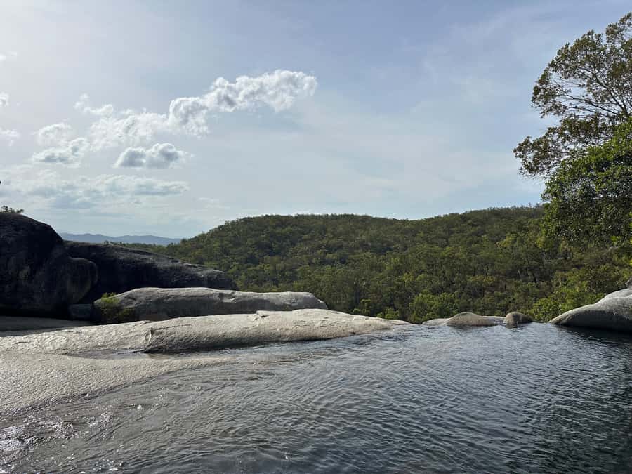 Cairns: Forest and Waterfalls Half-Day 4WD Guided Adventure - Trading pavement for rainforest creeks on the way to Clohesy