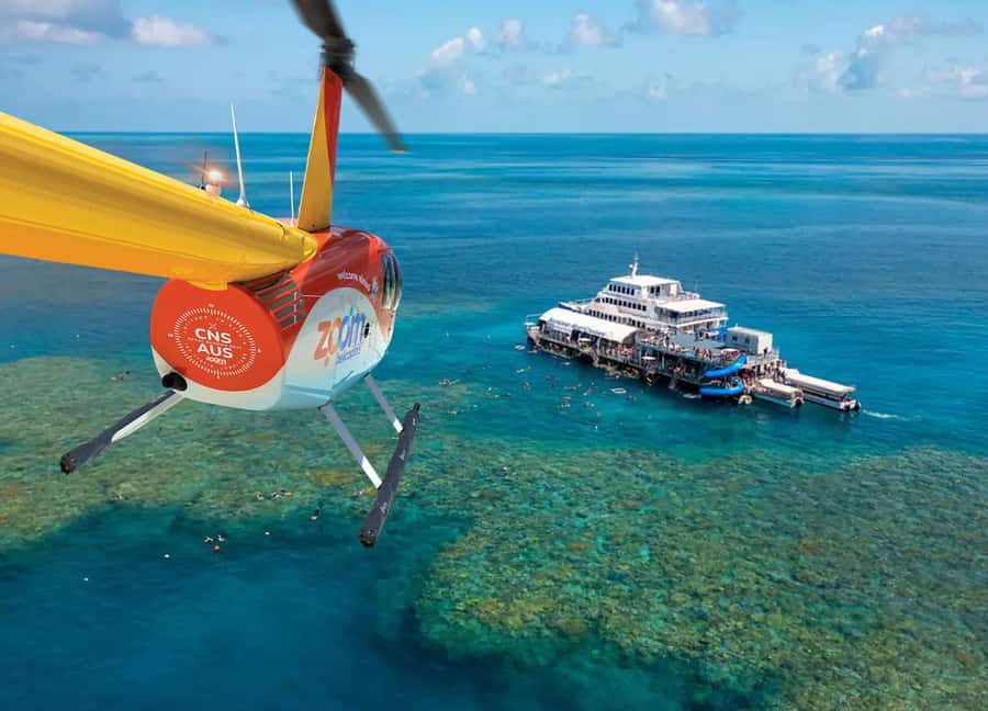 Cairns: Half Day Helicopter & Snorkeling Tour - Getting to Moore Reef: marine expert talk, then straight into the action