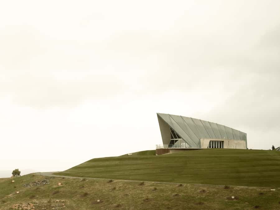 Canberra: City Highlights Day Tour with Entrance Fees - The Lodge pass-by: quick exterior context in a city of symbols
