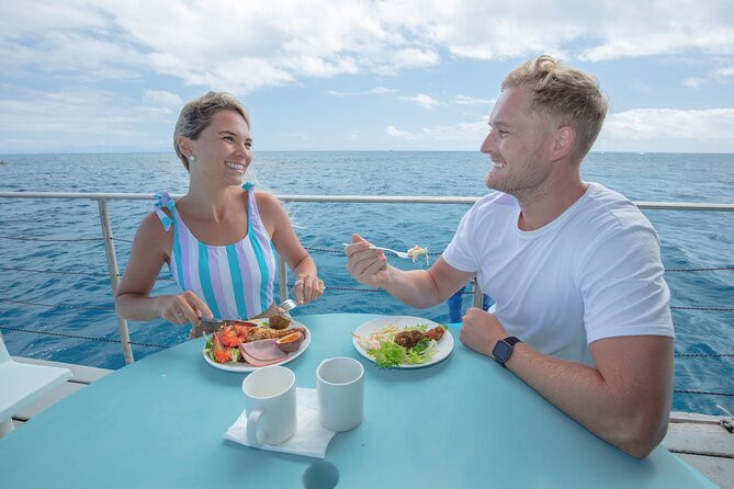 Full-Day Great Barrier Reef Pontoon with Snorkeling & Activities - Lunch and snacks: included food that affects comfort, not just hunger