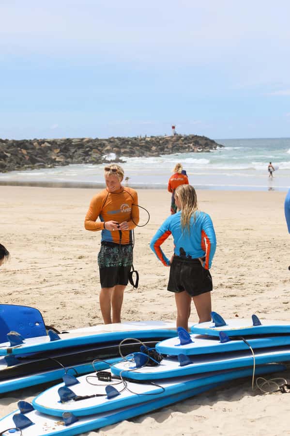 Gold Coast's Favourite Learn to Surf Lesson (Ages 13+) - Surfing with the Surfers Paradise skyline in view