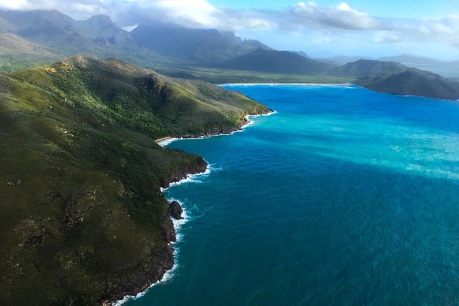 Great Barrier Reef and MOUA Snorkeling Day Tour from Townsville - Weather and conditions: how to set expectations