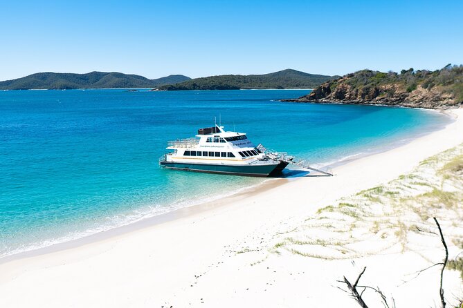 Great Keppel Island Adventure Tour - Snorkel and Boomnet - Starting your day: meeting point and how the catamaran experience feels