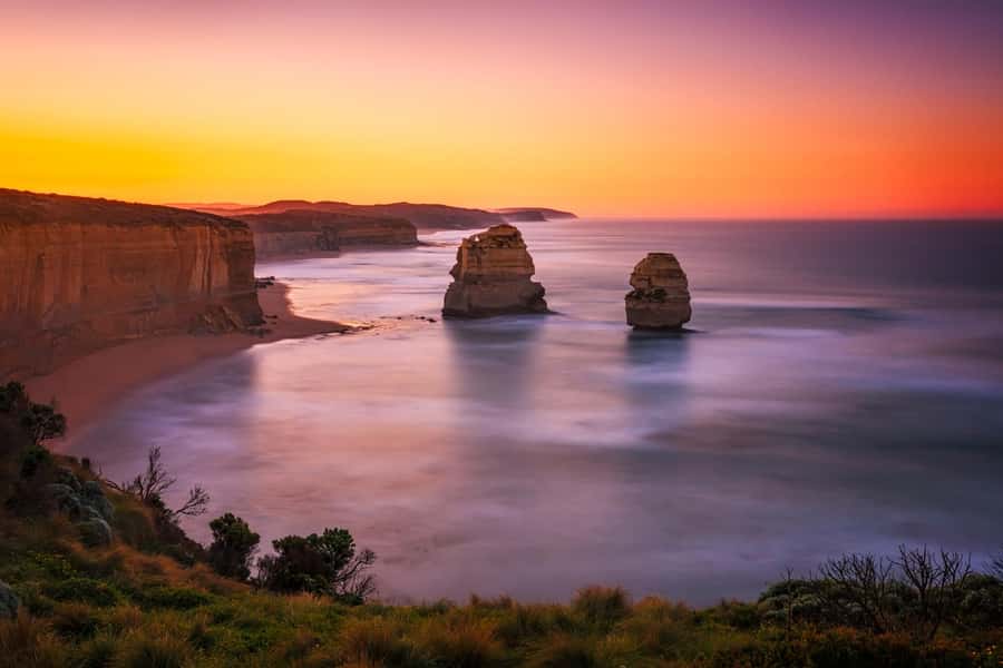 Great ocean road Reverse & Helicopter Experience Group Tours - Port Campbell and Great Ocean Road stops: guided context without the overload