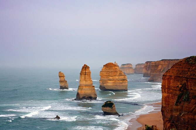Great Ocean Road Reverse Tour with Iconic Stops & Wildlife - Memorial Arch at Eastern View: closing with a famous coastal frame