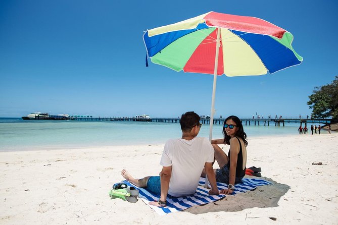 Green Island Full Day Trip from Cairns with City Transfers - Green Island National Park: boardwalks, beaches, and quick island time