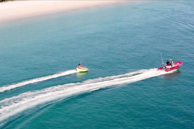 K'gari (Fraser Island) West Coast Half Day Cruise from Hervey Bay - Time on the beach: kayaking, swimming, and optional extras