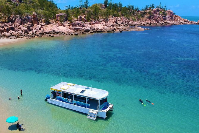 Magnetic Island Discovery Tour with Snorkeling & Paddle Boarding - Master Reef Guides on board: stories you can use