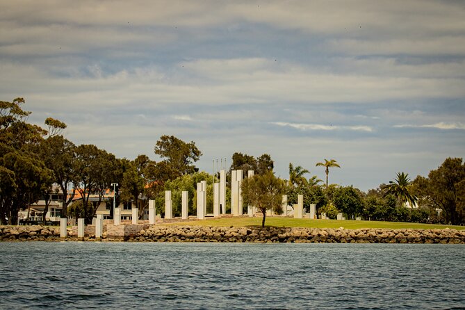 Mandurah Sunset Cruise - Passing the Mandurah War Memorial (Hames Sharley, 2005) From the Water