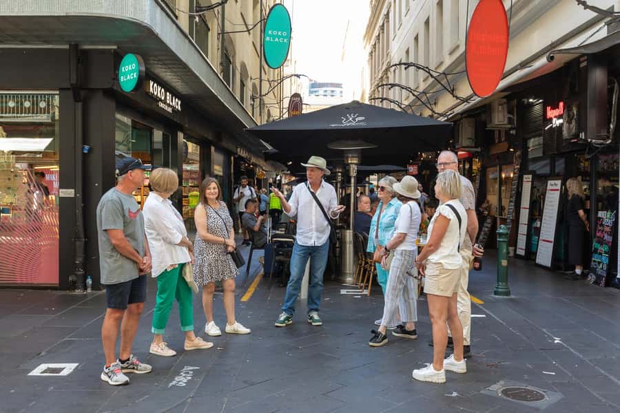 Melbourne: City Walking Tour with Local Guide - Bourke Street: trams, Parliament views, and independent bookshops