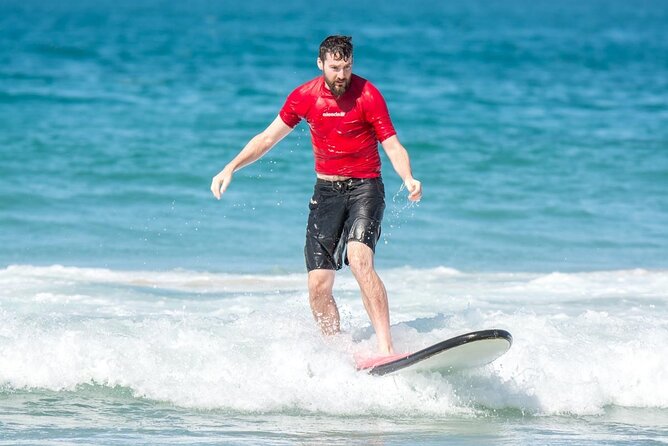 Merrick's Noosa Learn to Surf: 2 Hour group surfing lesson - On-Wave Coaching Time: Small Group Energy and Real-World Conditions