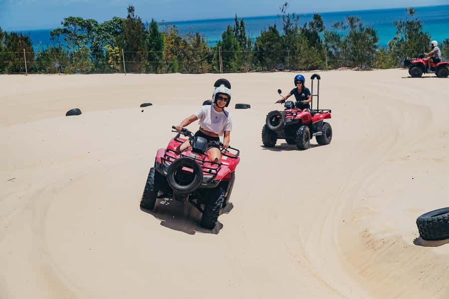 Moreton Island: Tangalooma Day Trip with ATV Quad Bike Tour - Your Tangalooma base: pools, bars, lockers, and no rushing