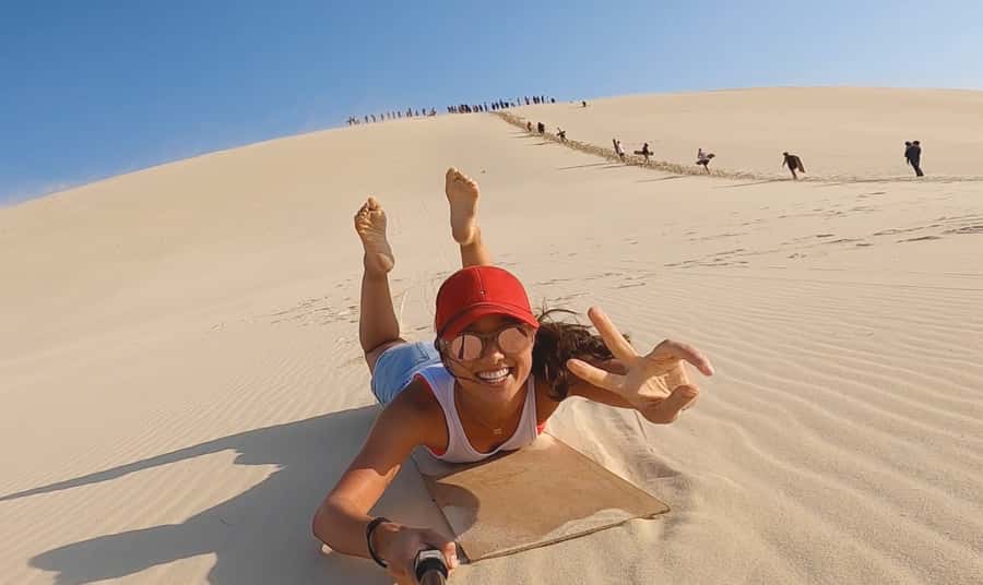 Moreton Island: Tangalooma Desert Safari and Dolphin Feeding - Desert Safari 4WD and sand tobogganing: thrills, heat, and the Doc factor