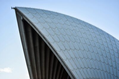 The white sails of the Sydney Opera House against a blue sky