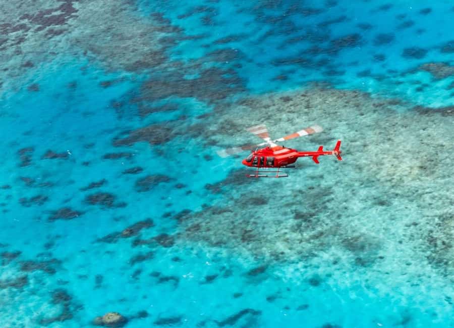 Port Douglas: Great Barrier Reef 45-Minute Helicopter Flight - The Port Douglas departure: 4-Mile Beach and that rainforest-meets-sea look