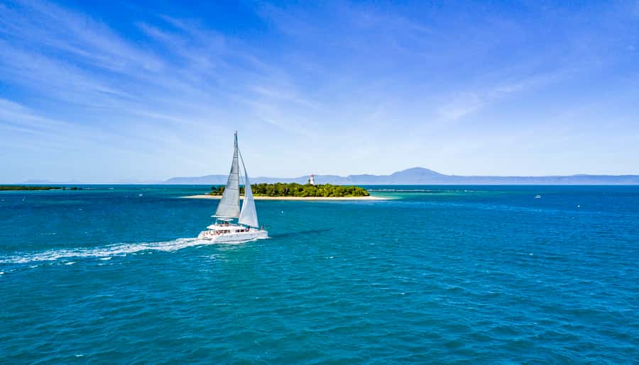 Port Douglas: Reef & Low Isles Cruise on Luxury Catamaran - Luxury catamaran morning: check-in, comfort, and beating the rush