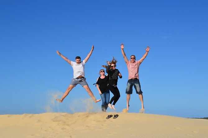 Port Stephens, Beach and Sand Dune 4WD Passenger Tour - Comfort on the move: air-conditioned 4WD and a small-group cap