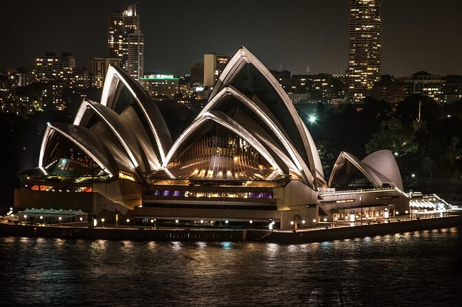 Private Sydney at Night Cruise for two guests - The Onboard Vibe: Sparkling Wine, Blankets, and a Real Skipper