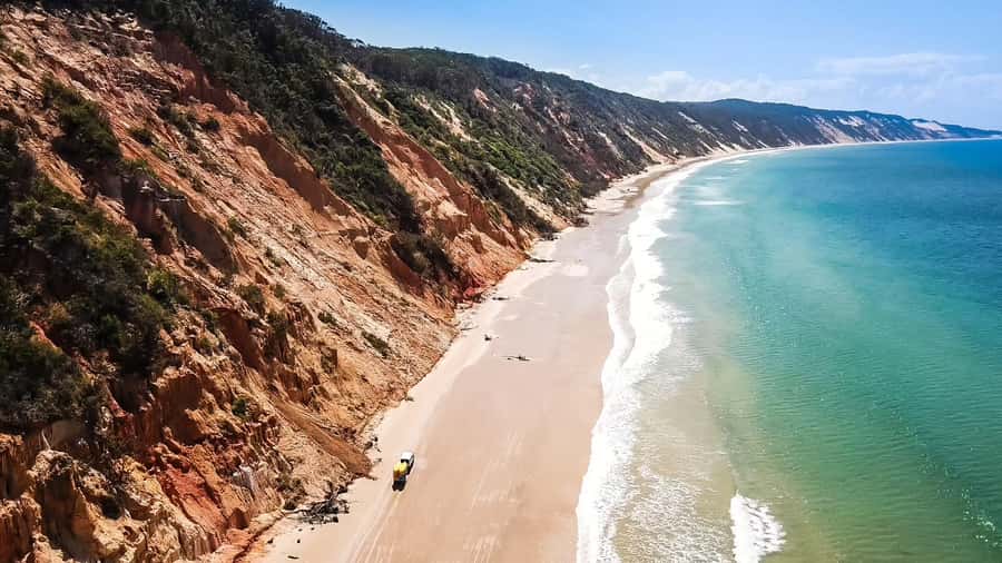 Rainbow Beach: Kayaking with Dolphins and Beach 4WD Tour - Guided sea kayaking around the headland: effort you’ll actually feel