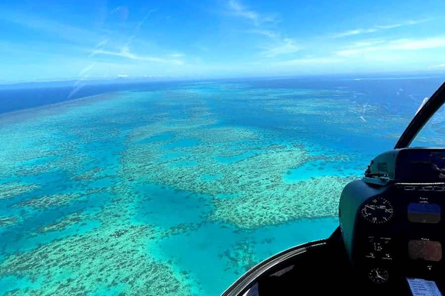 Reef Rainforest Fusion 45 minute scenic flight - Swinging toward the coast: Double Island and Palm Cove