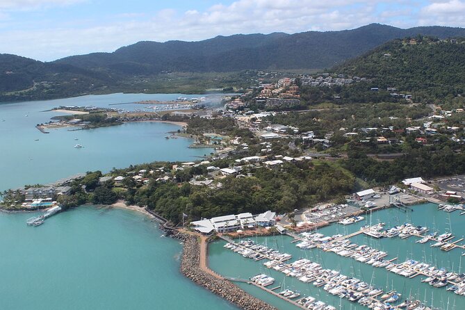 Reef & Whitehaven Spectacular - 60 Minute Helicopter Tour - First Flight Impressions: leaving Airlie Beach and getting oriented fast