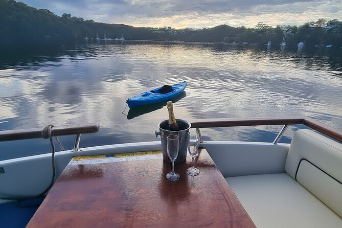Self Drive Boat Hire Sydney Harbour (No license required) - What Coral feels like on the water: shade, seating, and a cabin for comfort