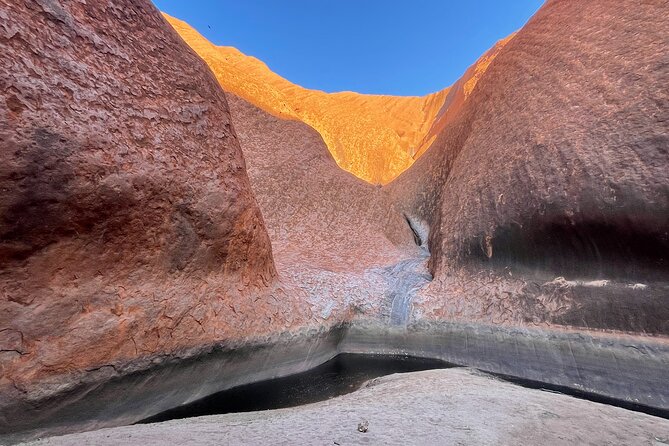 Sunrise Uluru Private Tour - Kuniya Walk and Rock Art Caves: Learning to Read the Features