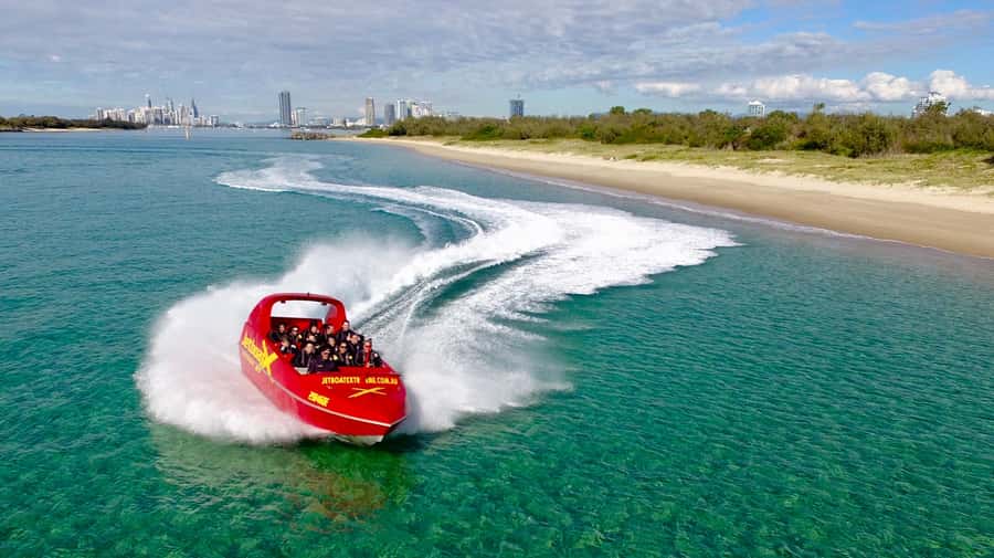 Surfer's Paradise: Jetboat Ride and Surf Lesson - Key highlights at a glance