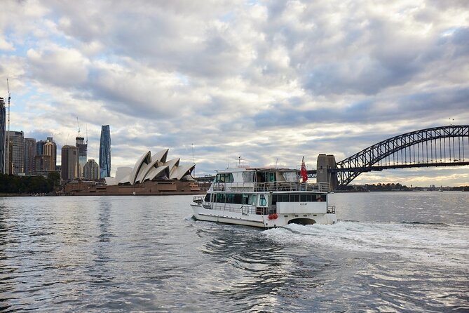Sydney Combo: Morning Sightseeing to Bondi & Harbour Lunch Cruise - Bondi Beach in 30 Minutes: Sand, Promenade, and Surfer Energy