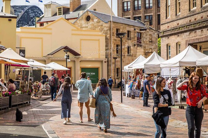 Sydney Private Half Day Tour: Beaches, History & Icons - The guide makes the day: Alex, Sam, and Gabi in real action