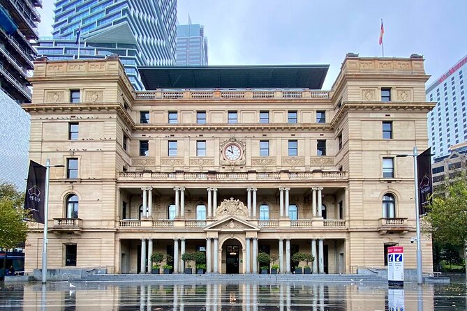 Sydney’s Iconic Sights: A Self-Guided Audio Tour - Walking Past The Rocks Market, Cadmans Cottage, and Customs House