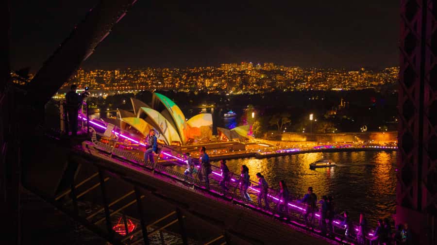 The Vivid Sydney BridgeClimb - The Summit experience: festival lights, Opera House views, and night-sky moments