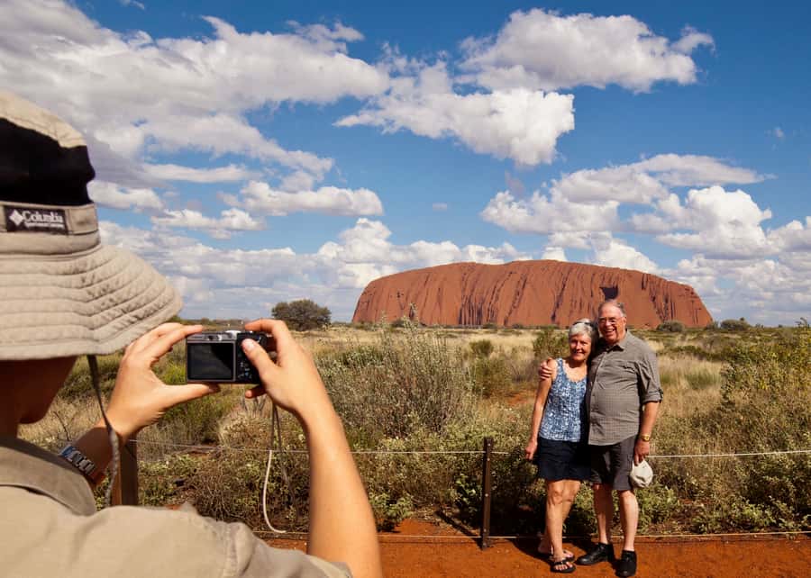 Uluru: Small Group Guided Tour with Sunset Refreshments - The short walk at the base: photos, scale, and a calmer pace