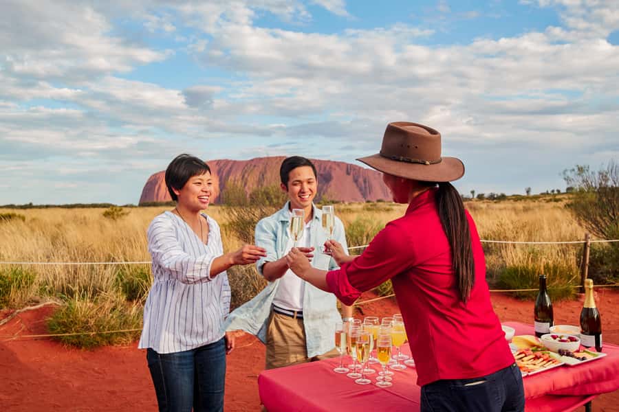 Uluru: Sunset, Sparkling Wine, Cheeseboard & Gourmet BBQ - Getting to the park: the coach ride and the timing that matters