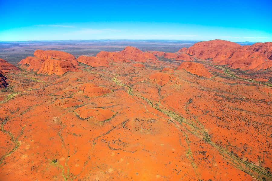 Yulara: Uluru & Kata Tjuta 25-Minute Helicopter Experience - Getting to the helipad: Yulara pickup and the bus ride setup